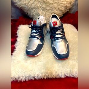 I’m selling brand new MK shoes red sliver and blue size 10